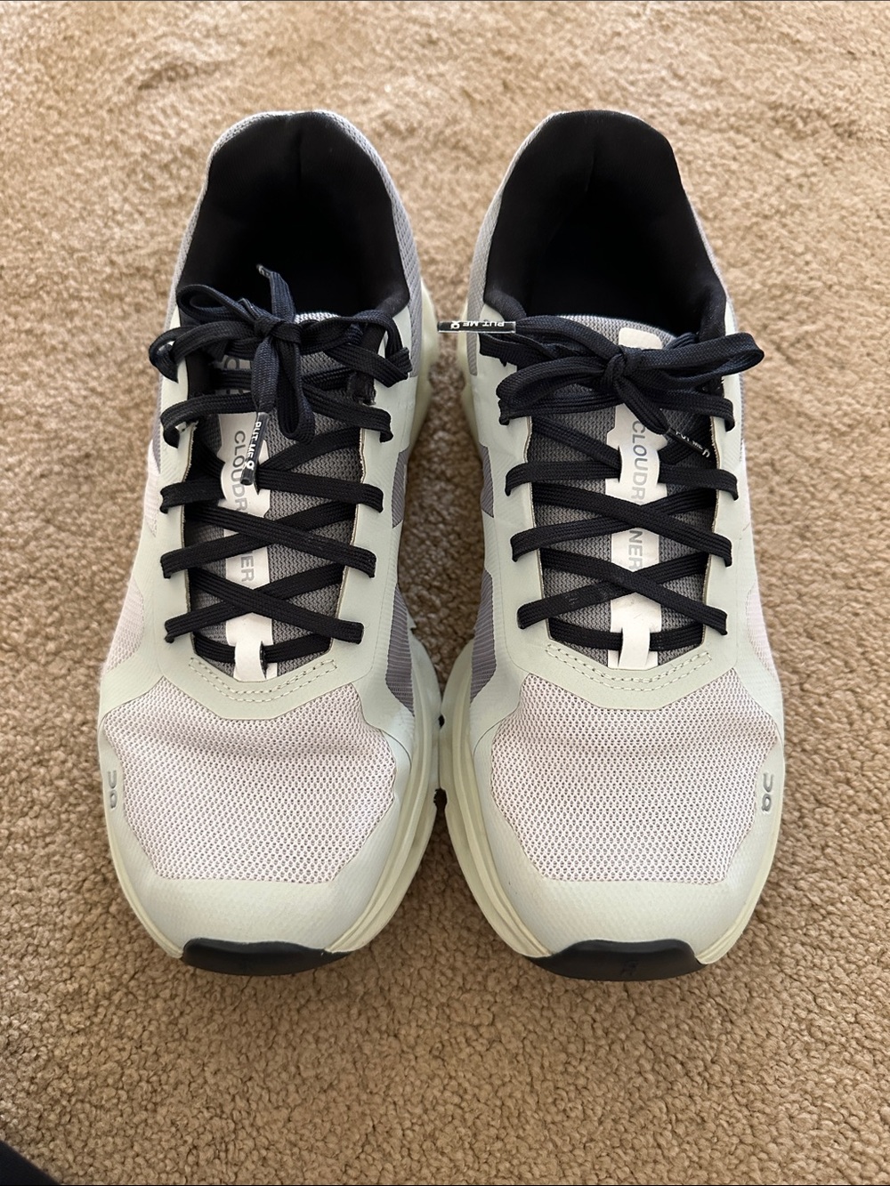 On Running women’s Cloudrunner Shoes in White and Black